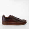 COLE Cognac Welted Distressed Sneakers.