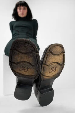 IVES Urban-black Laceless Boots. -Untamedstreet Shop Female wearing IVES black laceless zipped leather boots 243240