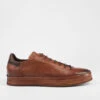 HAYES Cognac Distressed Welted Sneakers.