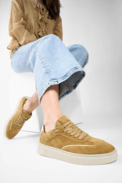 MAEVE Cool-mustard Suede Wingtip Sneakers. -Untamedstreet Shop MAEVE ochre yellow suede wingtip sneaker LF SS25 01057