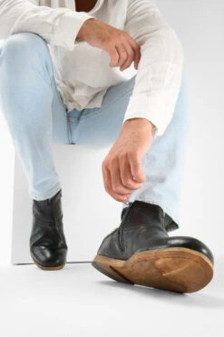 BRUCE Rugged-black Ankle Boots. -Untamedstreet Shop Men wearing BRUCE rugged black leather ankle boots 243002