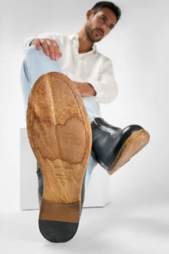 BRUCE Rugged-black Ankle Boots. -Untamedstreet Shop Men wearing BRUCE rugged black leather ankle boots 243021