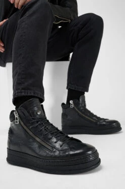 COLE Rugged-black Welted Double-zip High Sneakers. 18 COLE Rugged-black Welted Double-zip High Sneakers. -Untamedstreet Shop Men wearing COLE rugged black welted distressed zipped high leather sneakers 244054
