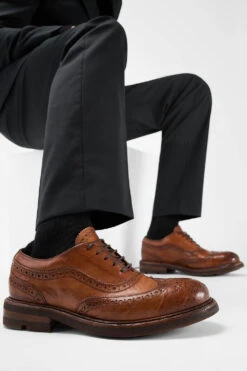 LENNOX Cognac Brogue Oxford Shoes. 17 LENNOX Cognac Brogue Oxford Shoes. -Untamedstreet Shop Men wearing LENNOX cognac brogue oxford leather shoes 243506