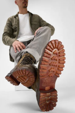 CAMDEN Tundra-brown Suede Combat Boots. -Untamedstreet Shop Model wearing CAMDEN men lace up boots tan brown luxury waxed suede 242568