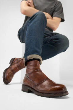 ROWLEY Cognac Folded Laceless Boots. -Untamedstreet Shop Model wearing ROWLEY cognac folded laceless leather boots 242205