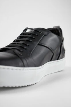 SKYE Tuxedo-black Studded Sneakers. -Untamedstreet Shop SKYESTUDlowtuxedo black sneakers trainers patinaleather untamedstreet madeinitalyMACROSSNEAKERS02180