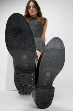 AVERY Jet-black Grunge Military Boots. -Untamedstreet Shop Women wearing AVERY jet black grunge lace up leather boots 244167