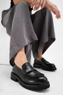 CAMDEN Jet-black Slip On Shoes. 24 CAMDEN Jet-black Slip On Shoes. -Untamedstreet Shop Women wearing CAMDEN jet black slip on leather loafer thick sole 244928